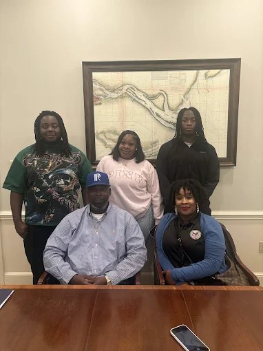 A family of five of our buyers at closing